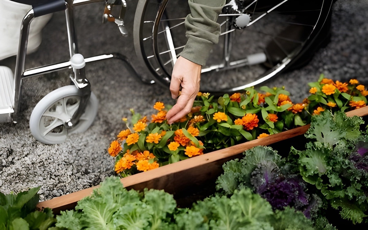 Senior woman gardening from her wheelchair while living independently at home