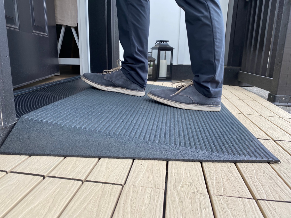 Textured, slip-resistant ramp surface underfoot at a home entry